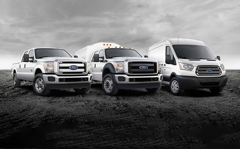 Ford Super Duty trucks and work van